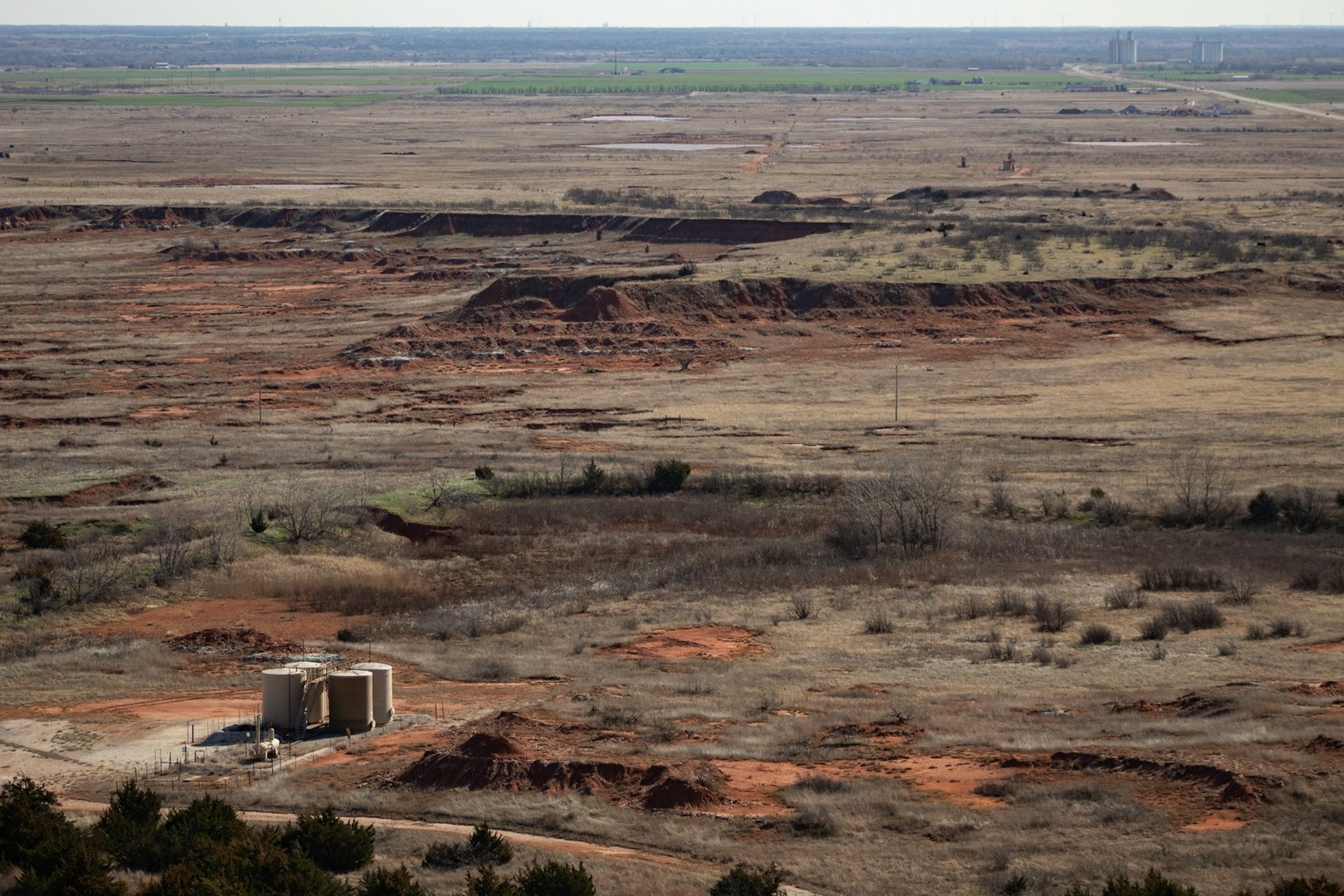 A secluded oil refinery in Oklahoma, U.S. A shot features a broad landscape