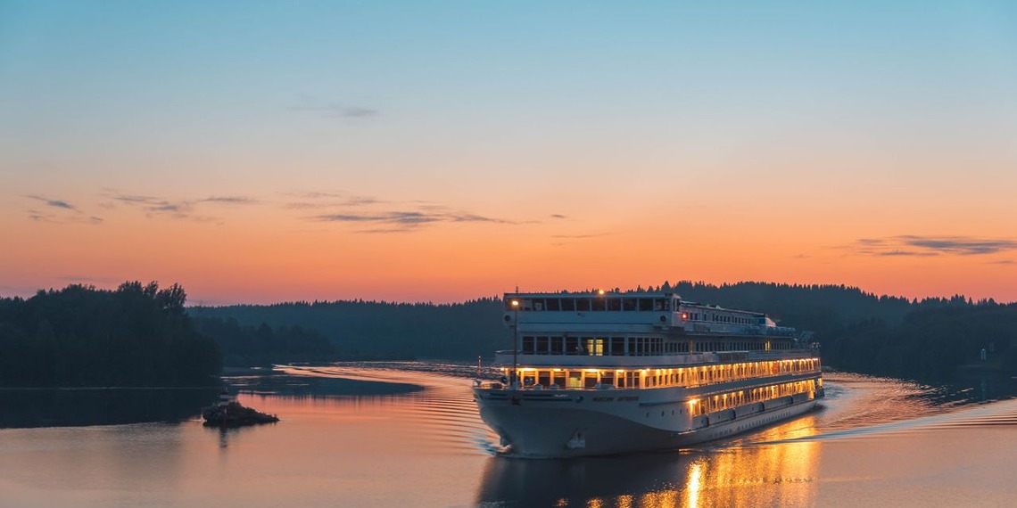 Passenger vessel crossing Lake Ladoga at sunset