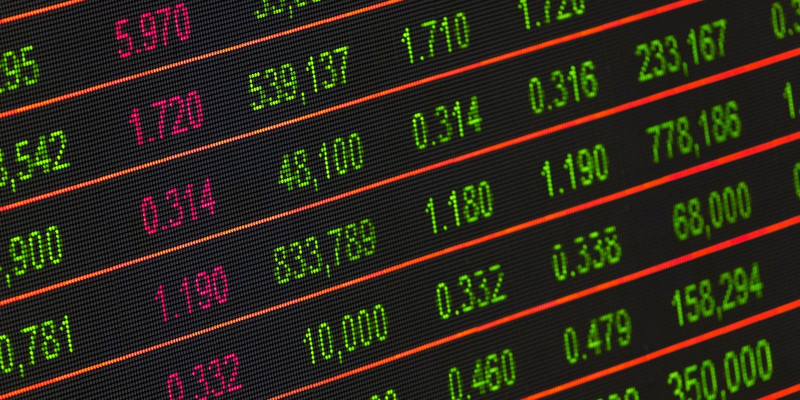 A digital stock market data display showing colorful financial numbers and trends.