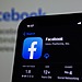 Facebook app displayed on a mobile phone.