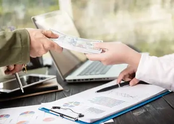 people handing over money