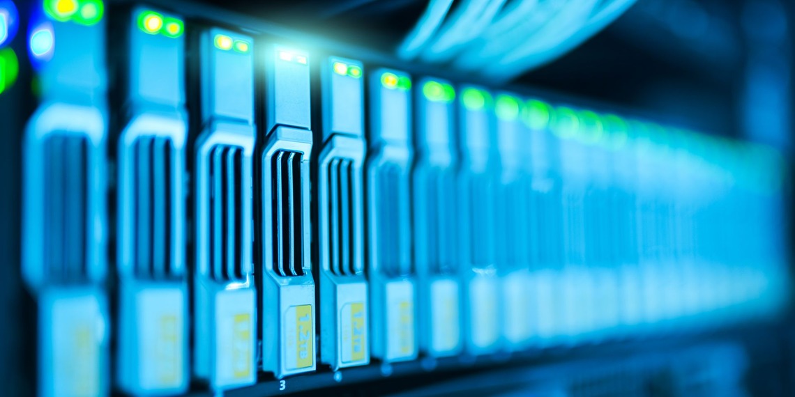Detailed image of a server rack with glowing lights in a modern data center.