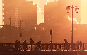 A city shrouded in heat haze during a summer heatwave.