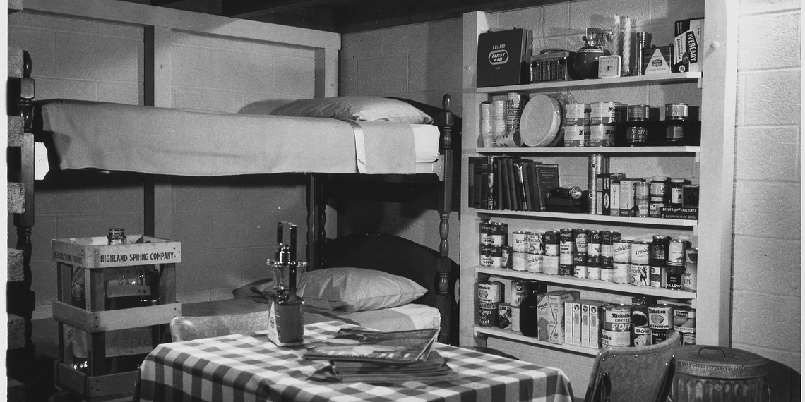 A family fallout shelter stocked with food, water, a battery-operated radio and other emergency supplies, circa 1957.