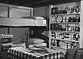 A family fallout shelter stocked with food, water, a battery-operated radio and other emergency supplies, circa 1957.