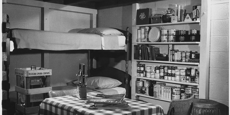 A family fallout shelter stocked with food, water, a battery-operated radio and other emergency supplies, circa 1957.