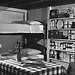 A family fallout shelter stocked with food, water, a battery-operated radio and other emergency supplies, circa 1957.