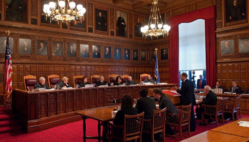 A New York courtroom, where judgments are pronounced.