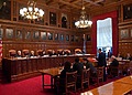 A New York courtroom, where judgments are pronounced.