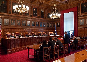 A New York courtroom, where judgments are pronounced.