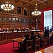 A New York courtroom, where judgments are pronounced.