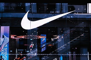 Nike's swoosh logo displayed at a flagship store.