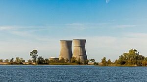 Nuclear plant cooling towers viewed across the water