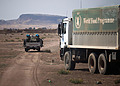 Ethiopian peacekeepers serving with the African Union/UNAMID escort World Food Programme trucks