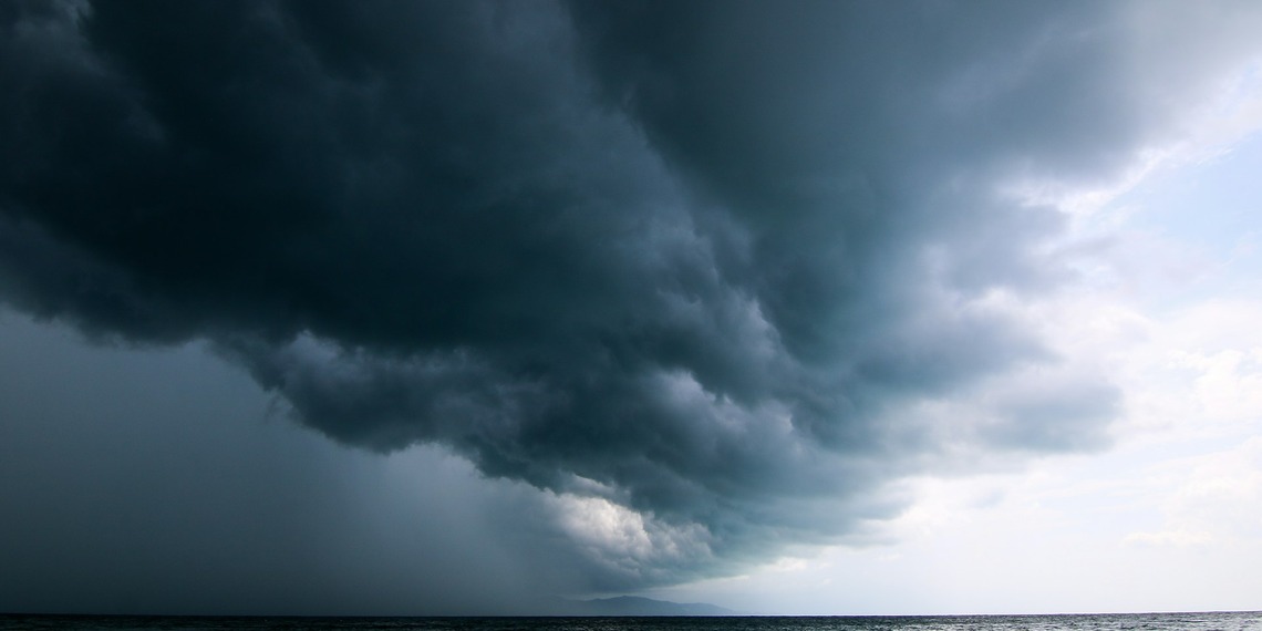 Dark storm clouds over ocean