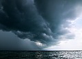 Dark storm clouds over ocean
