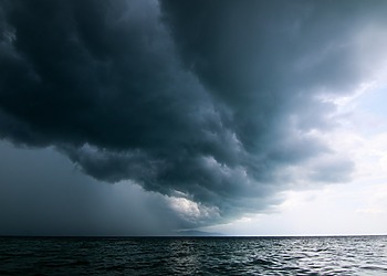 Dark storm clouds over ocean