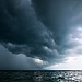 Dark storm clouds over ocean