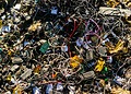Tangled electronic waste, including cables and chargers.