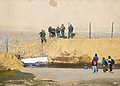 Migrants near the U.S.-Mexico border in Tijuana