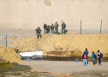 Migrants near the U.S.-Mexico border in Tijuana