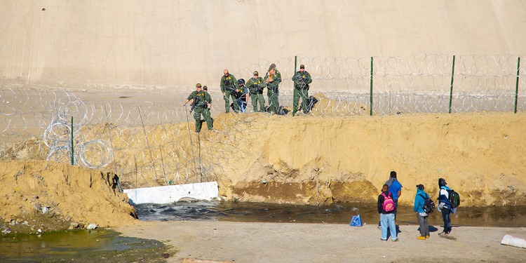 Migrants near the U.S.-Mexico border in Tijuana