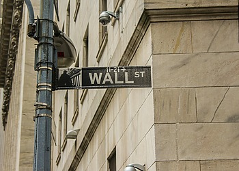 A Shot from within the city of the sign of the Wall St