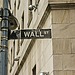 A Shot from within the city of the sign of the Wall St