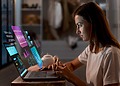 User reviewing an AI-powered digital interface on a computer screen