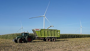 Tractor harvesting field