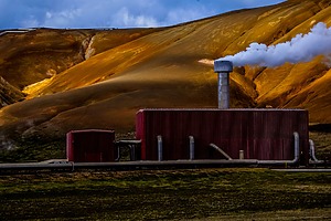 A geothermal power facility releases steam
