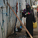 Aisha, a pregnant internally displaced person, going back into her shelter after getting water in Ammar Bin Yasser Camp in Aden, Yemen, Feb. 28, 2022.