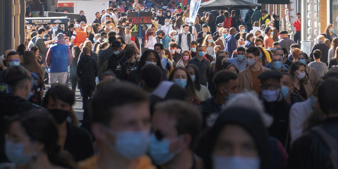 crown of people with masks during the covid-19 pandemic