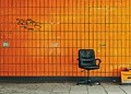 A thrown out office chair