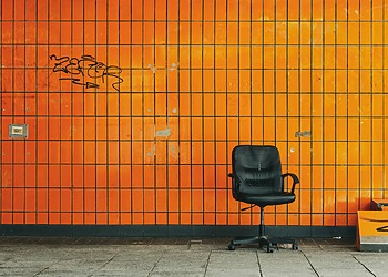 A thrown out office chair
