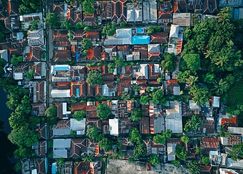 Colorful rooftops and greenery in Bangladesh.