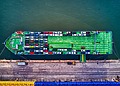 Aerial view of cars loaded on a car carrier ship.