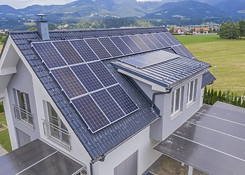 Home with rooftop solar panels supporting residential energy resilience