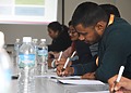 Business students participating in an interactive university seminar