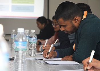 Business students participating in an interactive university seminar